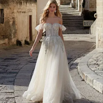 Muhteşem Peri A-Line düğün elbisesi Dantel Aplike Glitter Boncuklu Sequins Kapalı Omuz gelin kıyafeti Parlak Tül Vestidos De Novia